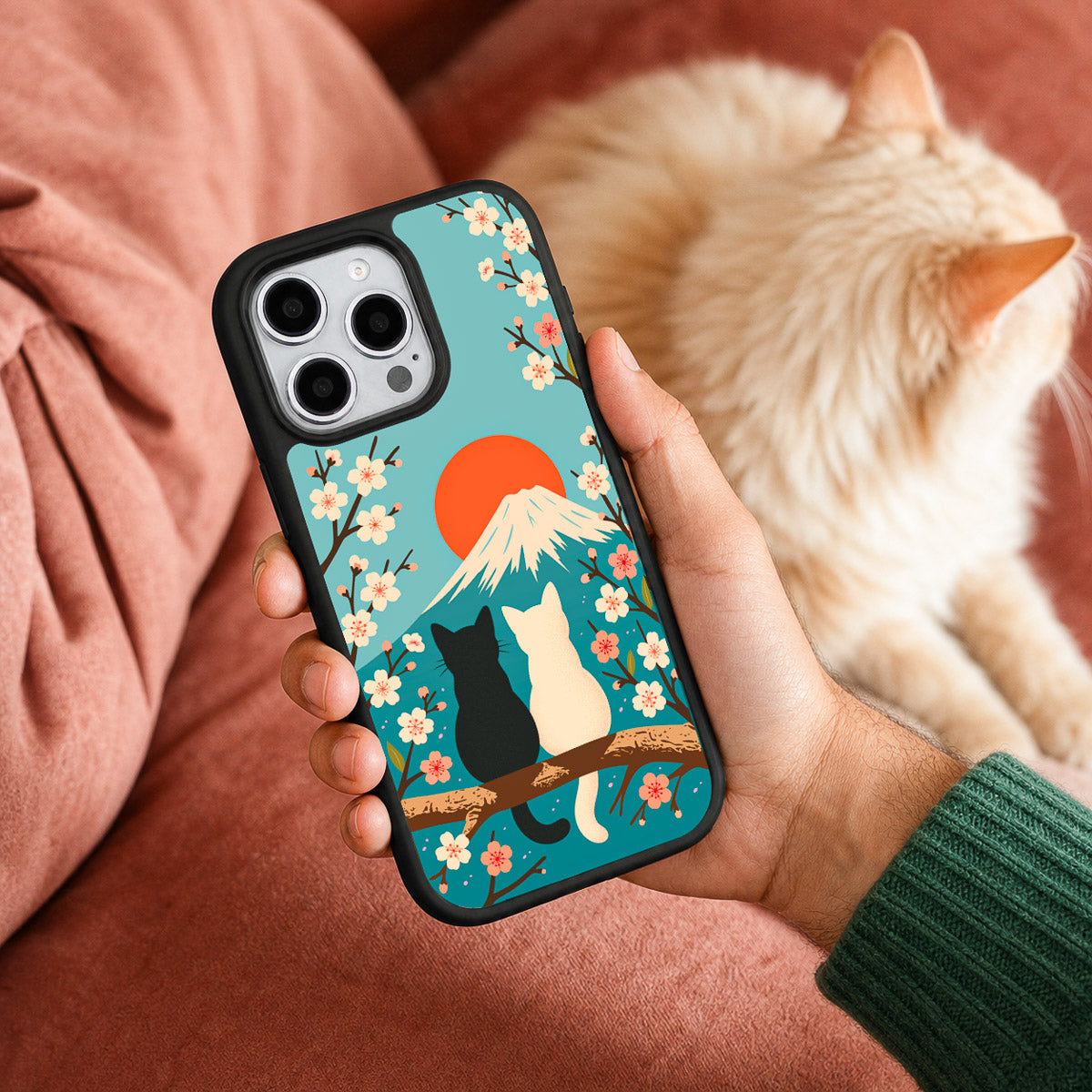 Fuji Cats iPhone 15 Pro Max case held in hand – lifestyle view